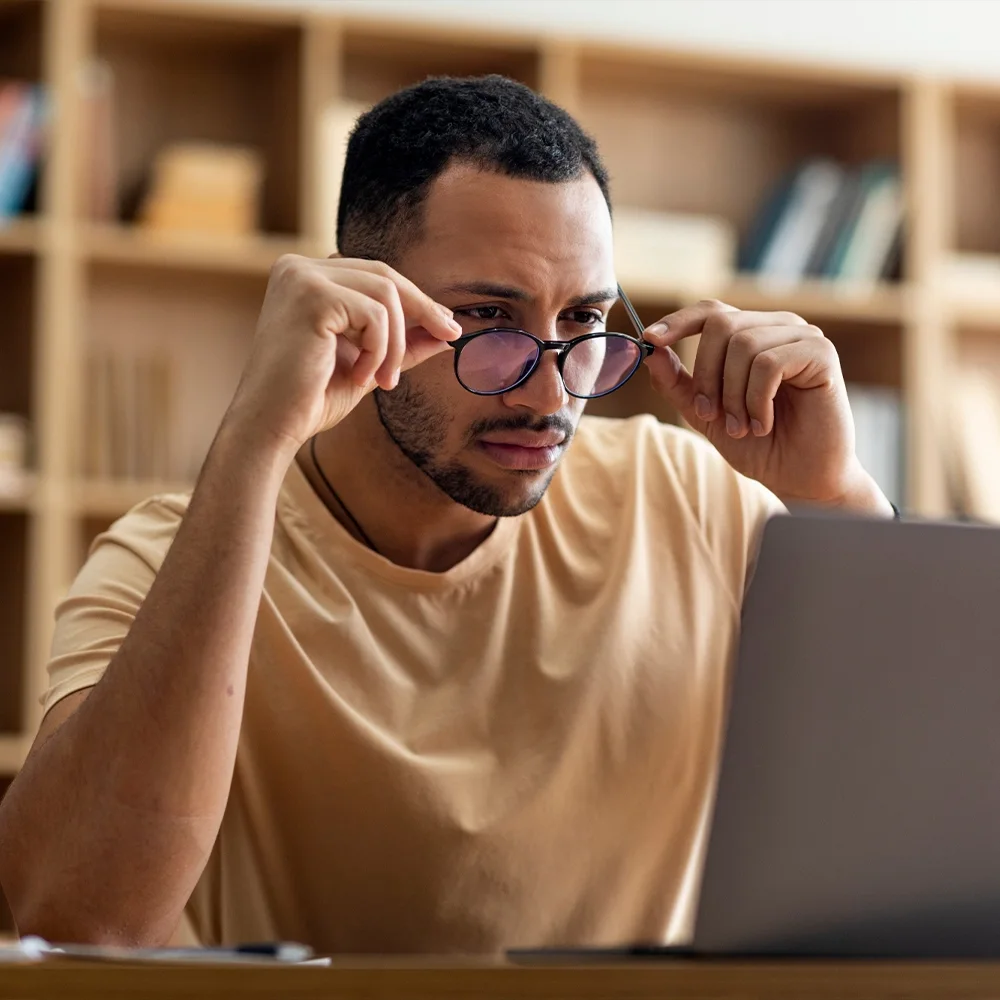 Man concentrating at his laptop during a deep-work block